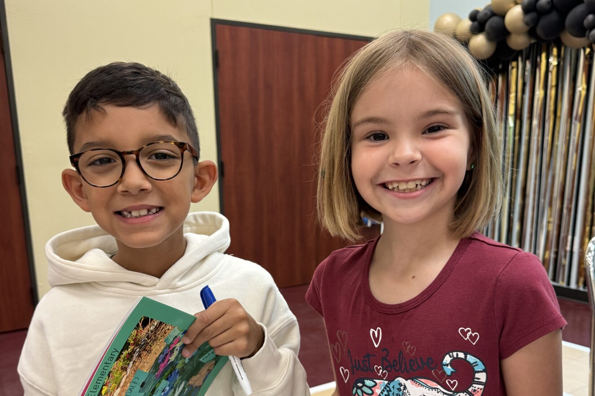 boy and girl smiling